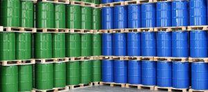 different colored oil drums on pallets